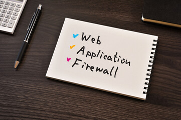 There is notebook with the word Web Application Firewall. It is as an eye-catching image.