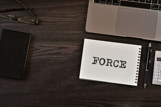 There is notebook with the word FORCE. It is as an eye-catching image.