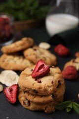 Cookies with freeze dried fruits and mint on grey table, closeup