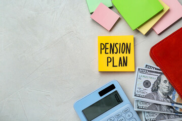 Note with words Pension Plan, banknotes and calculator on white office table, flat lay. Space for text