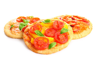 Different tasty mini pizzas on white background