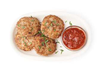 Plate with cutlets, chopped parsley and ketchup on white background