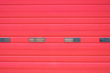A roll-down firehouse garage door background with space for copy