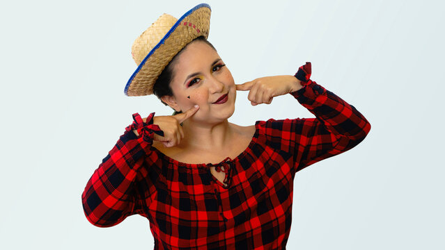 beautiful young brazilian woman with straw hat in red checkered outfit, smiling, typical - sao joao - santo antonio - sao pedro festa junina e festa julina do Brasil  transparent background
