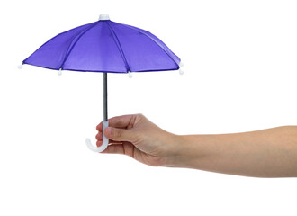 Human hand holding a small umbrella