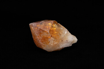 Natural Raw Citrine Point Gemstone with Black background which manifests good fortune