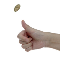 Hand tossing coin on white background