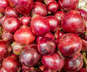 close-up of a lot of red onions, food background