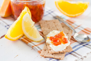 jam in glass jar with ingredients with crisp bread