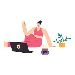 Yong woman watching online yoga classes on laptop, practicing yoga at home.