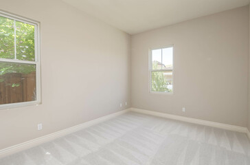 An empty residential room waiting to be filled: bare walls, vacant space, and untapped potential, offering a blank canvas for personalization and transformation.