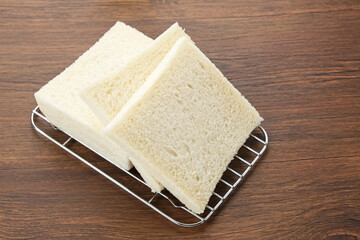 Sliced Loaf White Bread on wooden table
