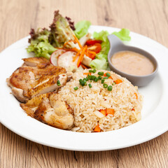 Garlic fried rice with grilled chicken and salad