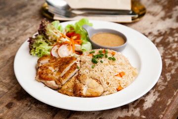 Garlic fried rice with grilled chicken and salad