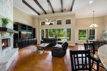 luxury living room with a fireplace