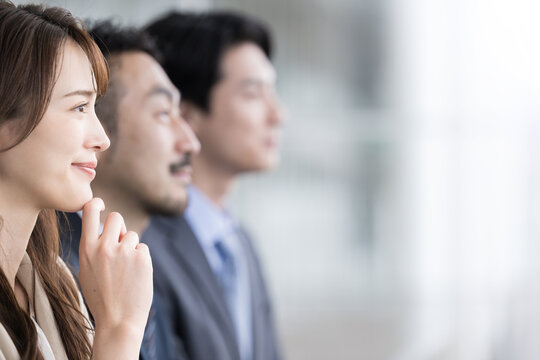 Business Scene Image Of Faces Side By Side Looking At The Future And Goals For Jobs And Changing Jobs