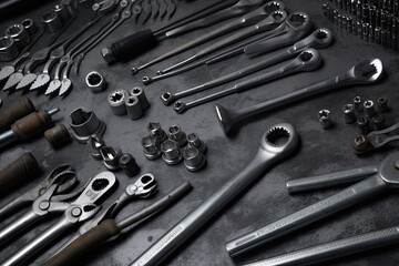 Fototapeta premium Set of tools and instruments on a black background. Top view