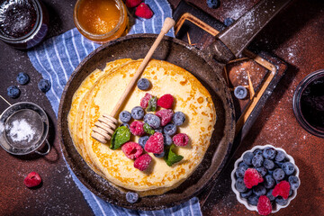 Crepes pancakes with berry