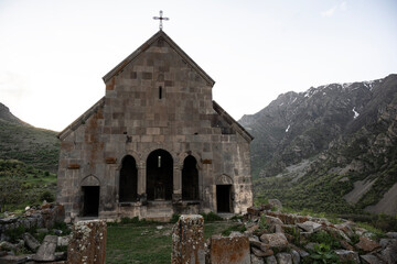 Fototapeta na wymiar fragments of an ancient stone church in the mountains of Armenia