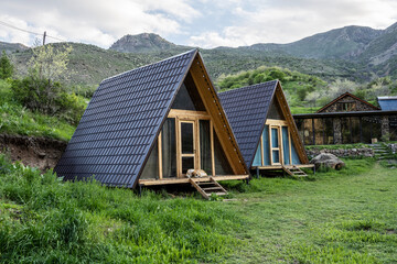 tourist house on a green slope in the mountains of Armenia