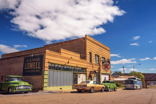 Lowell, Arizona, USA - October 17, 2018 : Historic Erie street with a vintage 1956 Ford F-100 car in Lowell. This ghost town situated on the other side of the Lavender Pit Mine is now part of Bisbee.