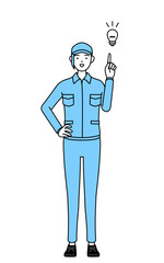 アイデアを思いついた帽子と作業着姿の女性