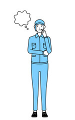 顔をかきながら考える帽子と作業着姿の女性