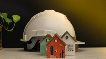 wooden house with safety helmet.