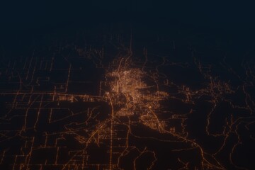 Aerial shot on Casper (Wyoming, USA) at night, view from west. Imitation of satellite view on modern city with street lights and glow effect. 3d render
