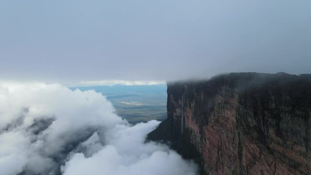 Drone flying along Tepuy Roraima huge wall mountain, Venezuela, Canaima National Park, South America