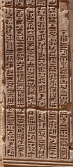 Ancient egyptian hieroglyphs carved on walls of Karnak temple in Luxor, Egypt 