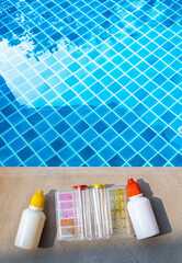 Water tester over clear swimming pool water, best water quality, pool maintenance, water test kit,...