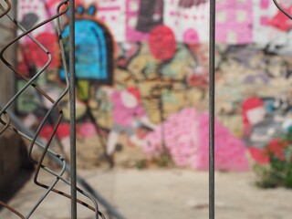 Urban Broken Fence and Graffiti 