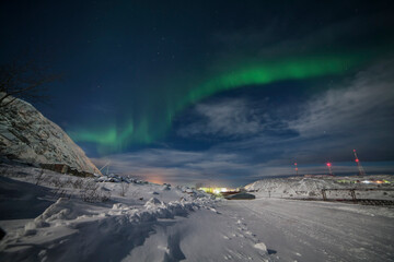 night landscape with northern lights and aurora winter by the sea