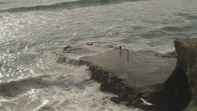 Fisherman on the cliff
