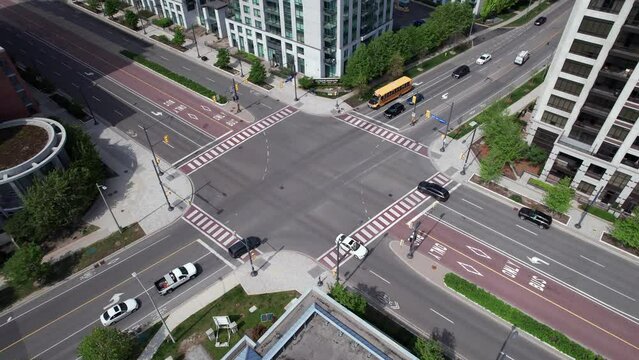Rising orbit of intersection car traffic in Markham, Ontario with condominiums at Clegg Road and South Town Centre Boulevard.