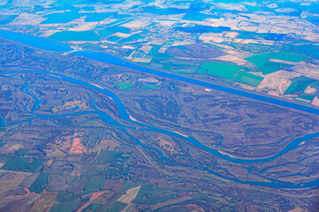 River landforms view from above . Aerial view of countryside with meadows and rivers