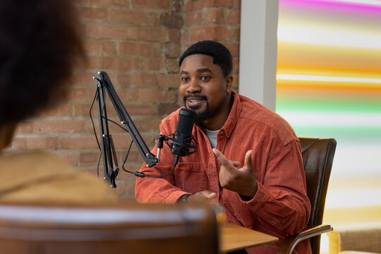 Influencer recording a podcast in a recording studio