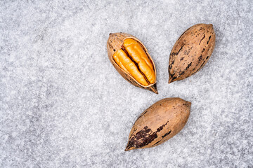 Pecan nuts on the vintage background