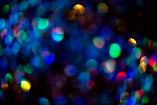 Bright shiny glowing bokeh art background. Festive abstract colorful background with bokeh defocused lights. Lights bokeh. Abstract background for overlay design.