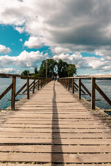 Obraz premium Vertical shot of the Isla de las Almas Navegantes with cloudy sky in the background in Chile