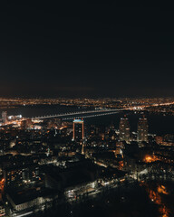 Fototapeta na wymiar Night aerial view of the city of Dnipro, Ukraine. Left side of the city. Central part of the city.