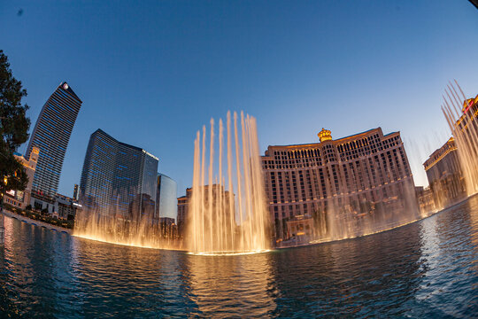 Las Vegas Bellagio Hotel Casino, featured with its world famous fountain show, at night with fountains in Las Vegas, Nevada.