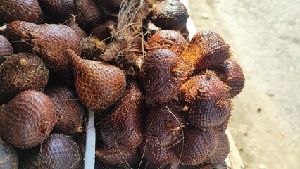 snake fruit sold on the side of the road