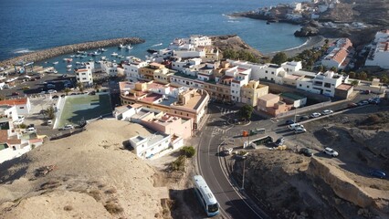 Fototapeta na wymiar Drone shot of San Miguel de Tajao town with fishing port in Tenerife, Canary Islands