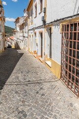 Beautiful building painted in white and yellow in the historic area of the city of Portalegre