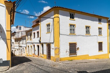Fototapeta na wymiar Beautiful building painted in white and yellow in the historic area of the city of Portalegre