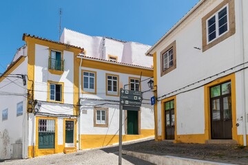 Beautiful building painted in white and yellow in the historic area of the city of Portalegre