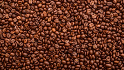 Fototapeta premium Roasted Coffee Beans Background Top View. Aromatic Grain, Caffeine Texture.