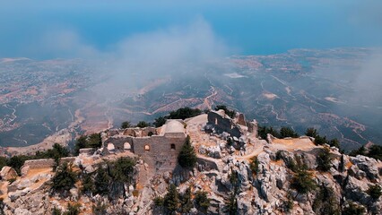 Fototapeta na wymiar Buffavento Castle in Kyrenia, North Cyprus on sunny day with cloudy sky